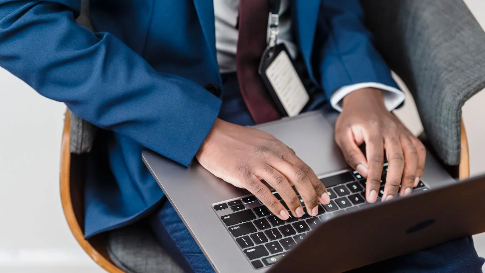 Professional working on a laptop reviewing an outreach inbox