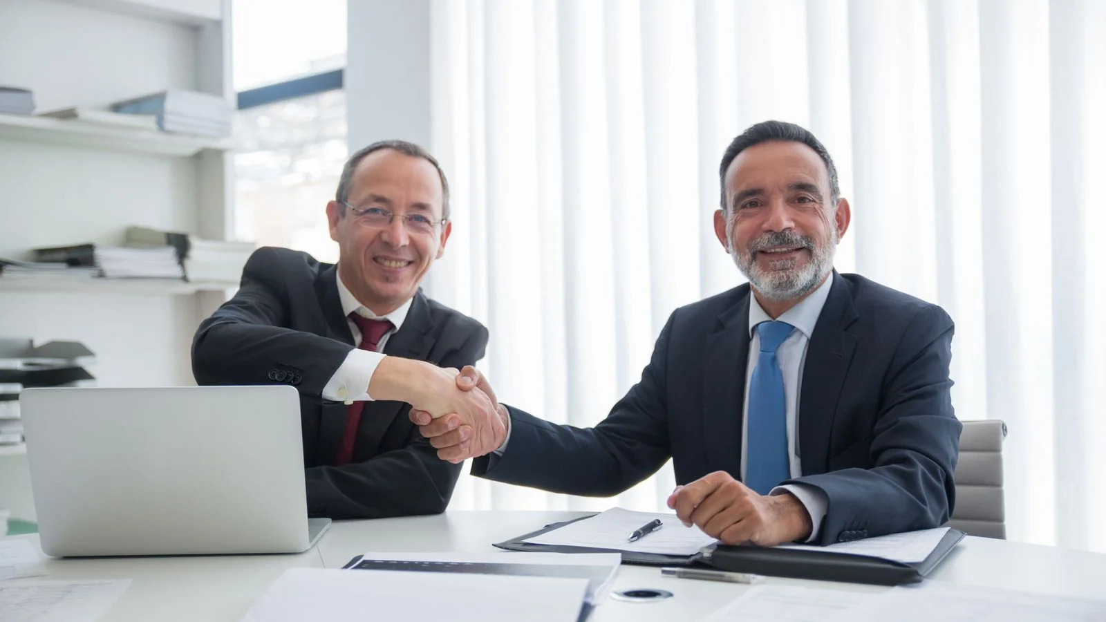 Two professionals shaking hands to close a deal, the continuity a single relationship promises