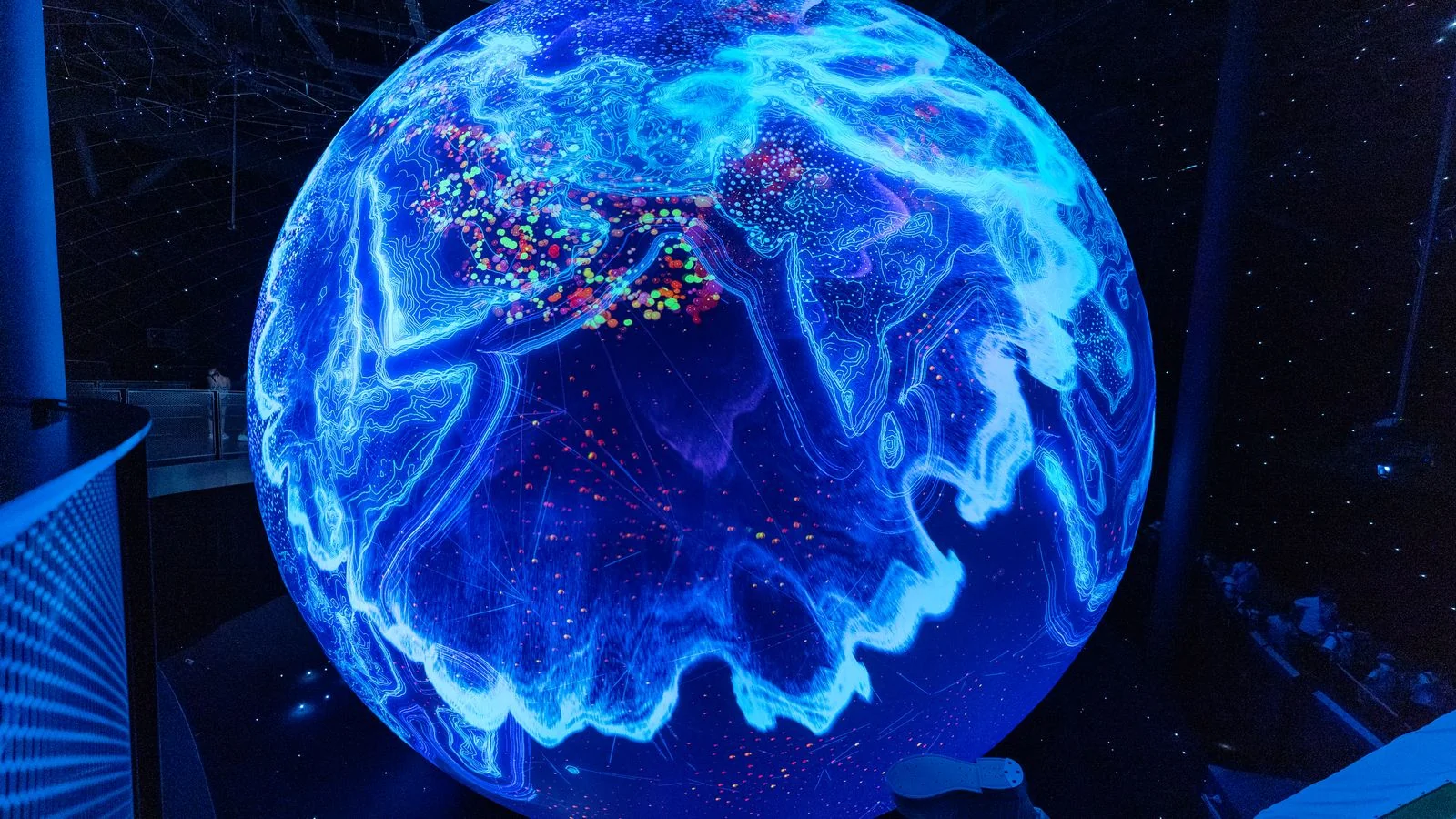 Illuminated globe display at a science museum, a nod to Quora's worldwide audience