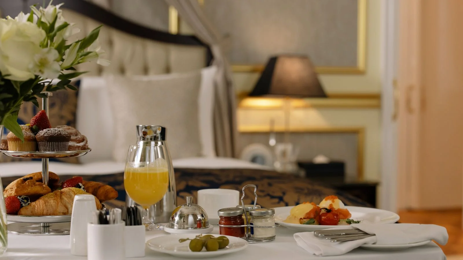 A breakfast table set with pastries and juice, the detail guests are most likely to name in a review.