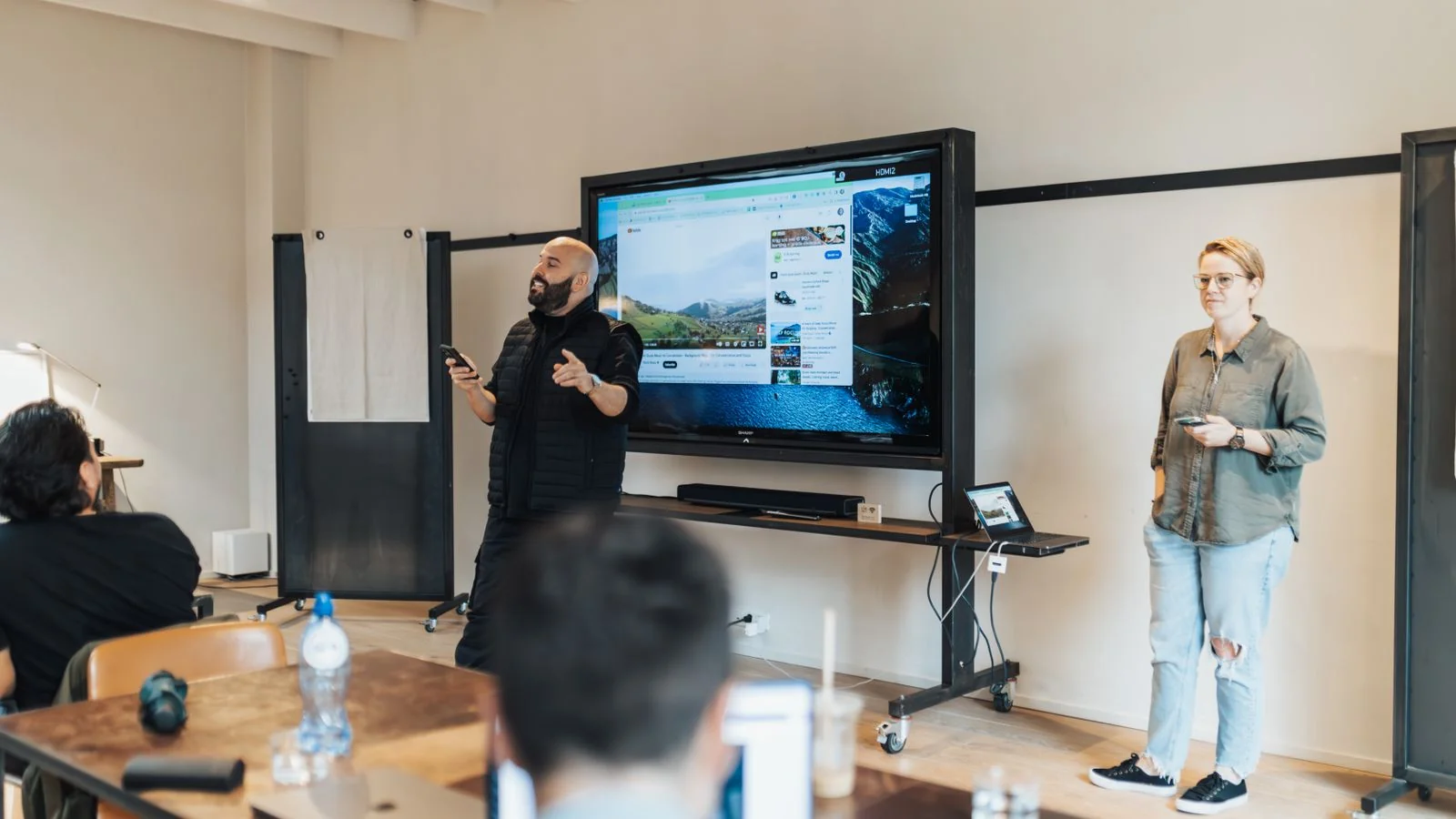 A team presentation in a meeting room.