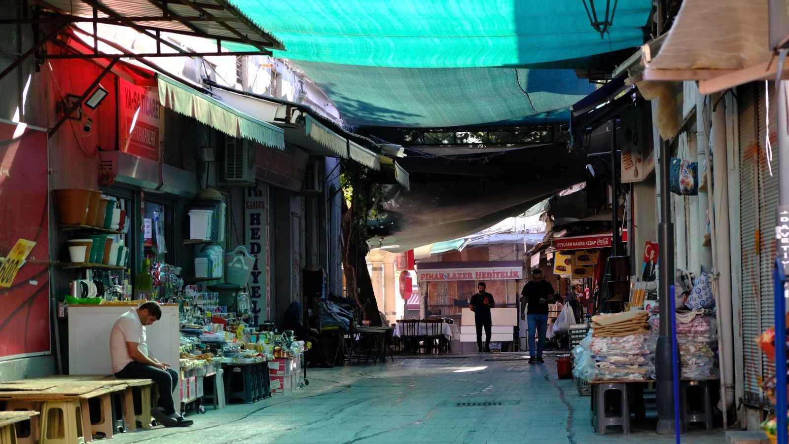 A neighbourhood shopping street lined with awnings, where Yelp's relevance varies block by block